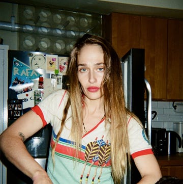 a person preparing food in a kitchen setting
