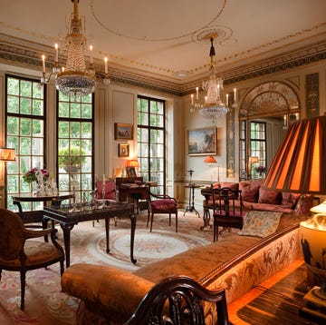 neoclassically decorated reception room with louis xvi cut glass chandeliers and 18th century mahogany furniture